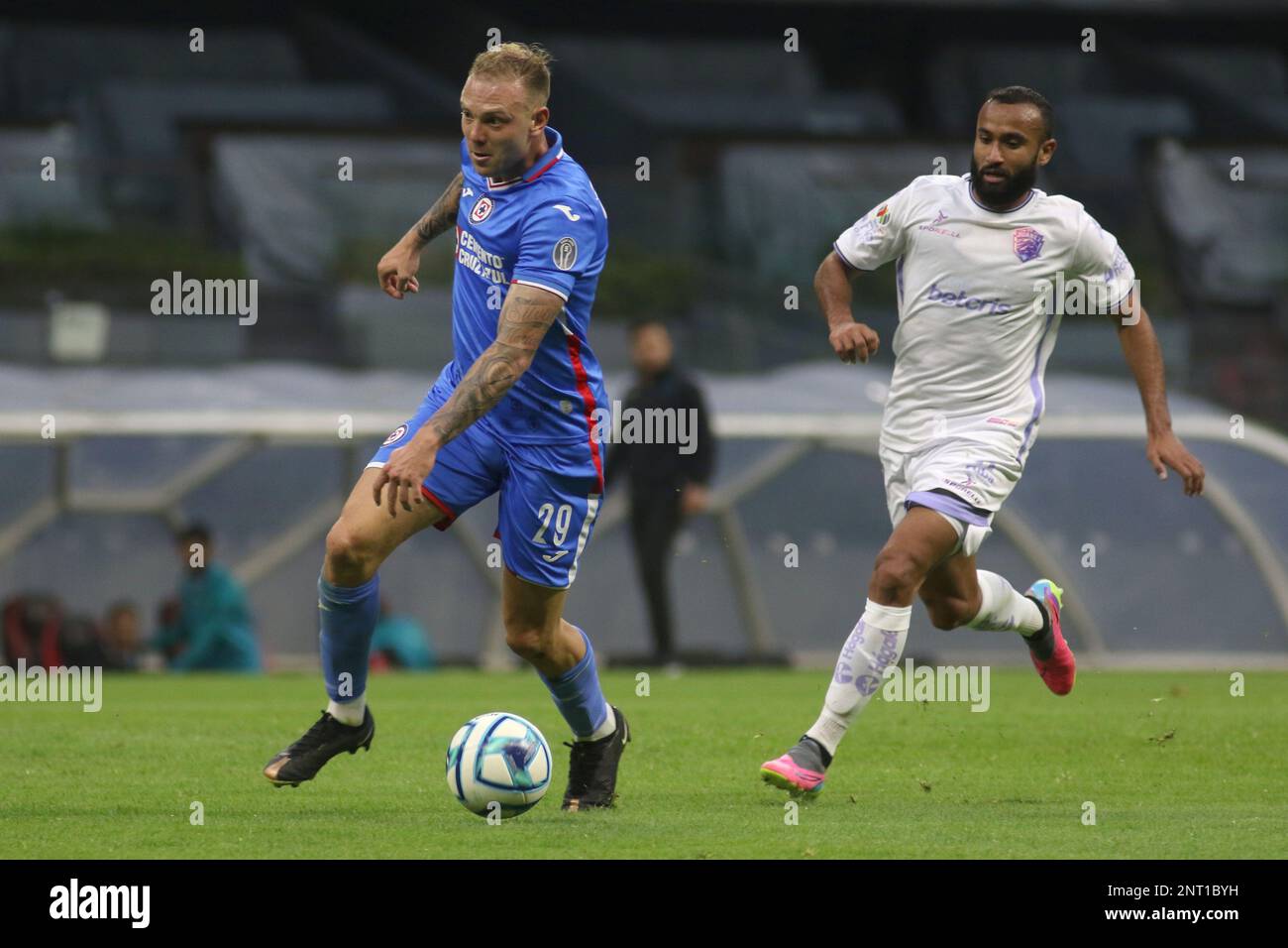 Mexico City, Mexico. 25th Feb, 2023. Jordan Sierra of the Juarez FC and Carlos Rotondi of the Cruz Azul team in action during the match between Cruz Azul and Juarez FC of the Closing Tournament 2023 at Aztec Stadium. on February 25, 2023 in Mexico City, Mexico. (Credit Image: © Ismael Rosas/eyepix via ZUMA Press Wire) EDITORIAL USAGE ONLY! Not for Commercial USAGE! Stock Photo