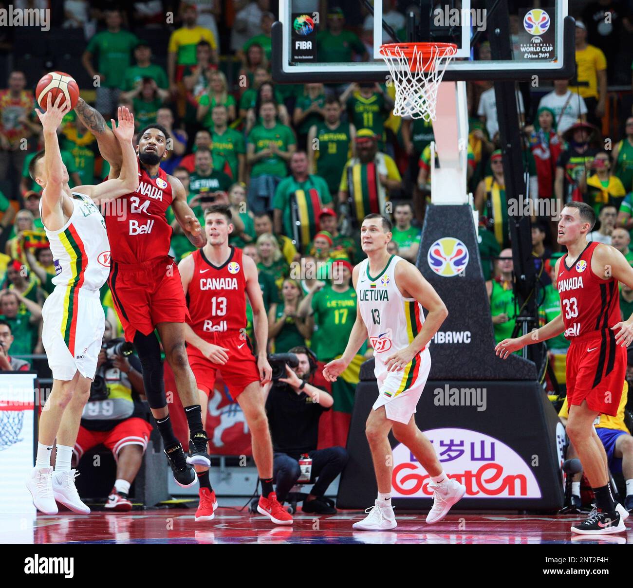Canada's Khem Birch (L2), Conor Morgan (L3) and Kyle Wiltjer (R1) compete  with Lithuania's Arnas Butkevicius (L1) and Paulius Jankunas (R2) during a  group H match in the FIBA Basketball World Cup