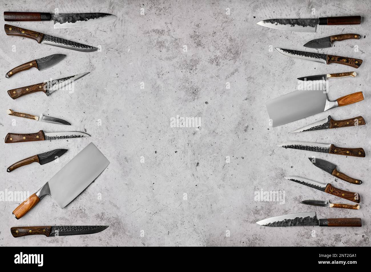 Overhead composition with different kinds of butcher's knives Stock