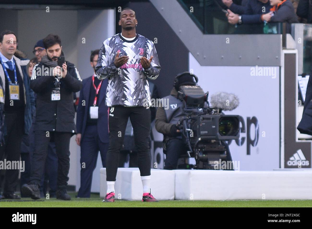 Paul Pogba (Juventus) prays as he returns to the pitch for a warm-up after a six-month injury break during the Serie A Football match between Juventus Stock Photo