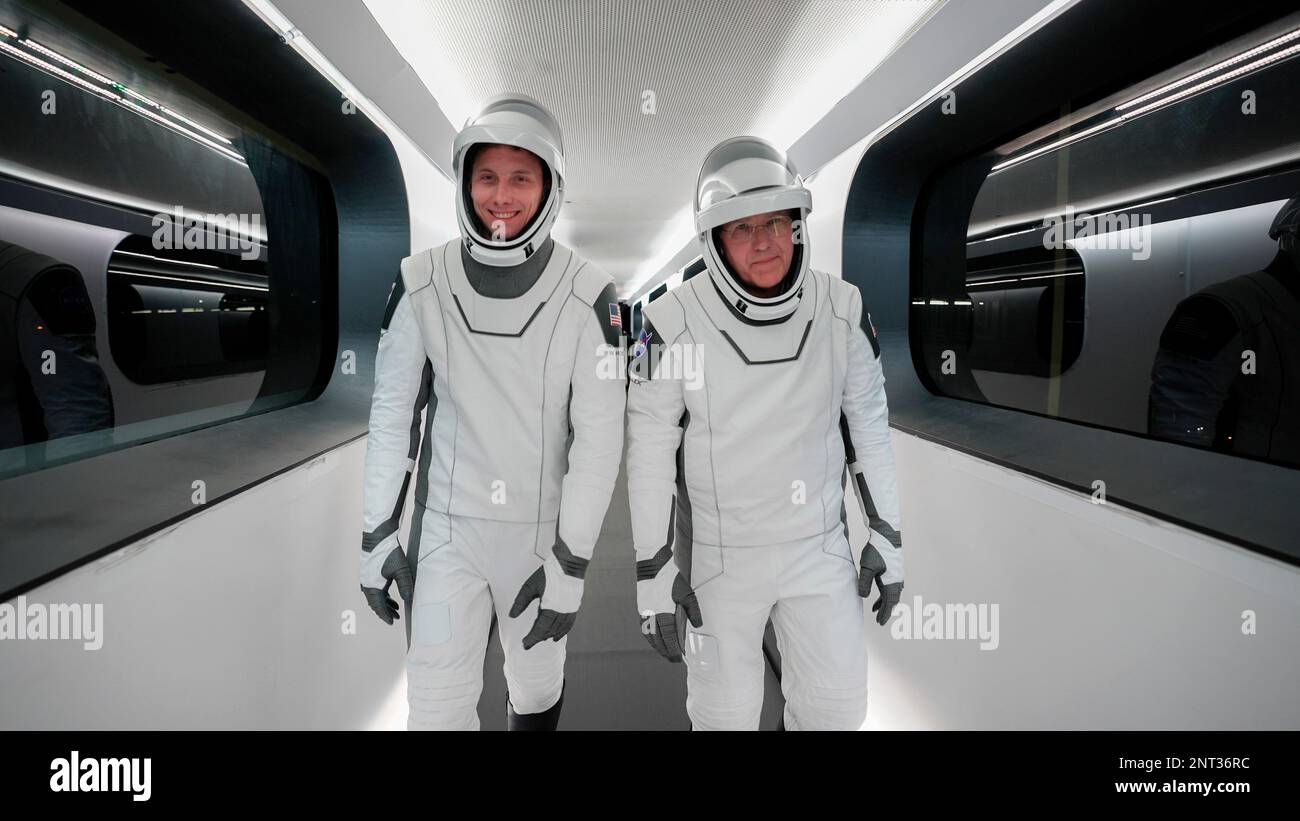 Cape Canaveral, United States of America. 26 February, 2023. NASA SpaceX prime crew members astronauts Woody Hoburg, left, and Stephen Bowen walk down the crew access arm to the Dragon spacecraft Endeavour during a countdown dress rehearsal at the Kennedy Space Center, February 23, 2023 in Cape Canaveral, Florida. Credit: Handout/SpaceX/Alamy Live News Stock Photo