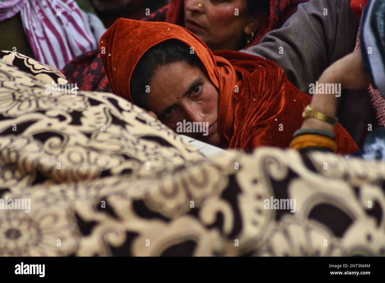 Srinagar, India. 26th Feb, 2023. Wife of Kashmiri pandith Sanjay Sharma