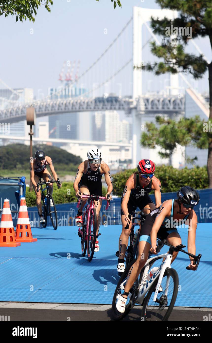 Competitors ride a bicycle during the ITU World Triathlon Mixed