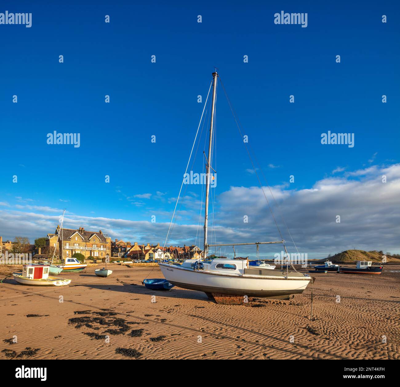 Sunny view in Spring across Alnmouth harbour in Northumberland looking towards the village with Church Hill in the background, England, united Kingdom Stock Photo