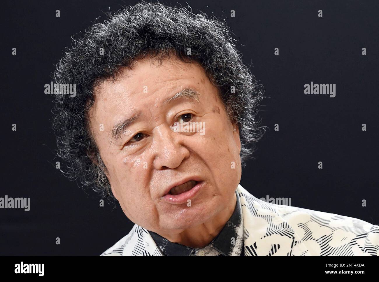 Kishin Shinoyama, a Japanese photographer, speaks during an interview ...