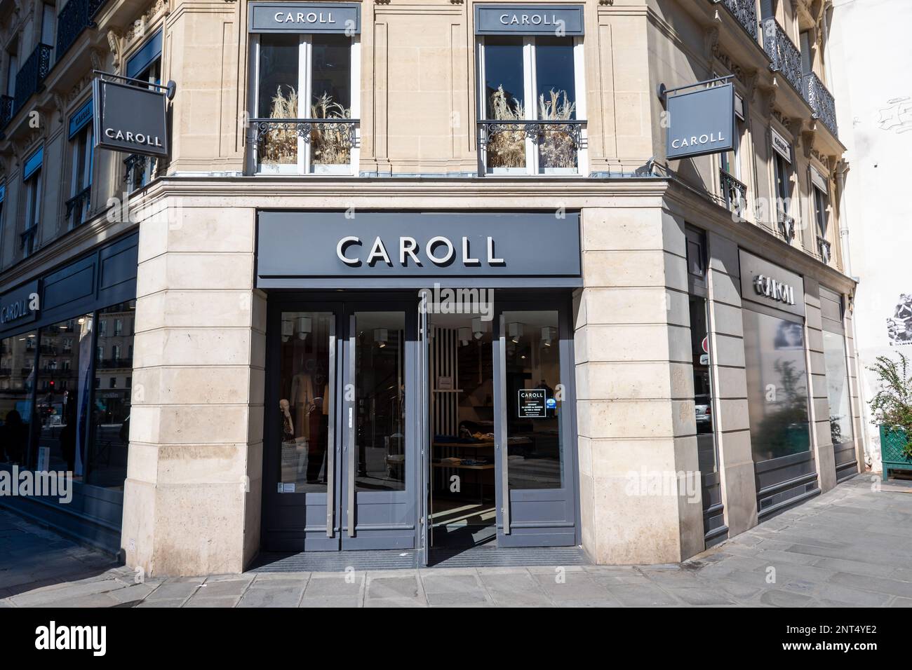 Exterior view of a Caroll boutique, a French company specializing in  women's ready-to-wear fashion and accessories Stock Photo - Alamy