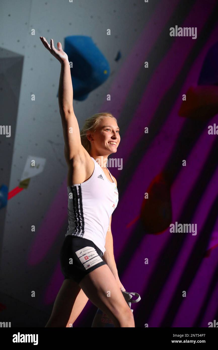 Slovenia's Janja Garnbret celebrates after winning the women's