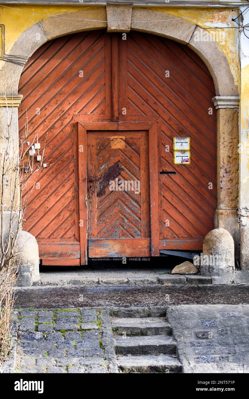 Very old wood gate in old city of small european city. Stock Photo