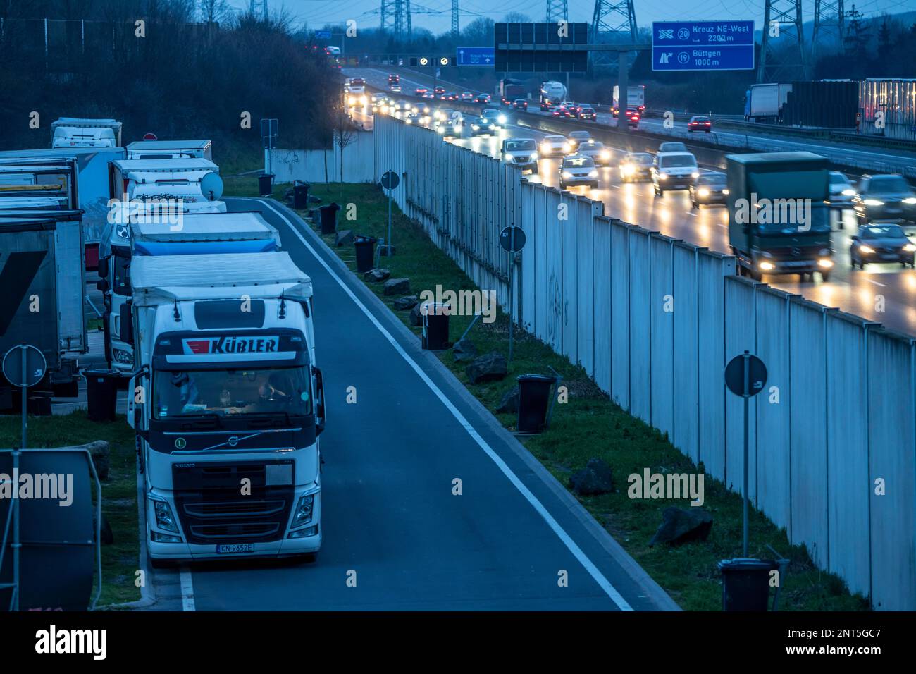 Motorway A57 near Kaarst in the Rhine district of Neuss, view in the direction of the Büttgen junction, heavy evening traffic, car park, full of truck Stock Photo