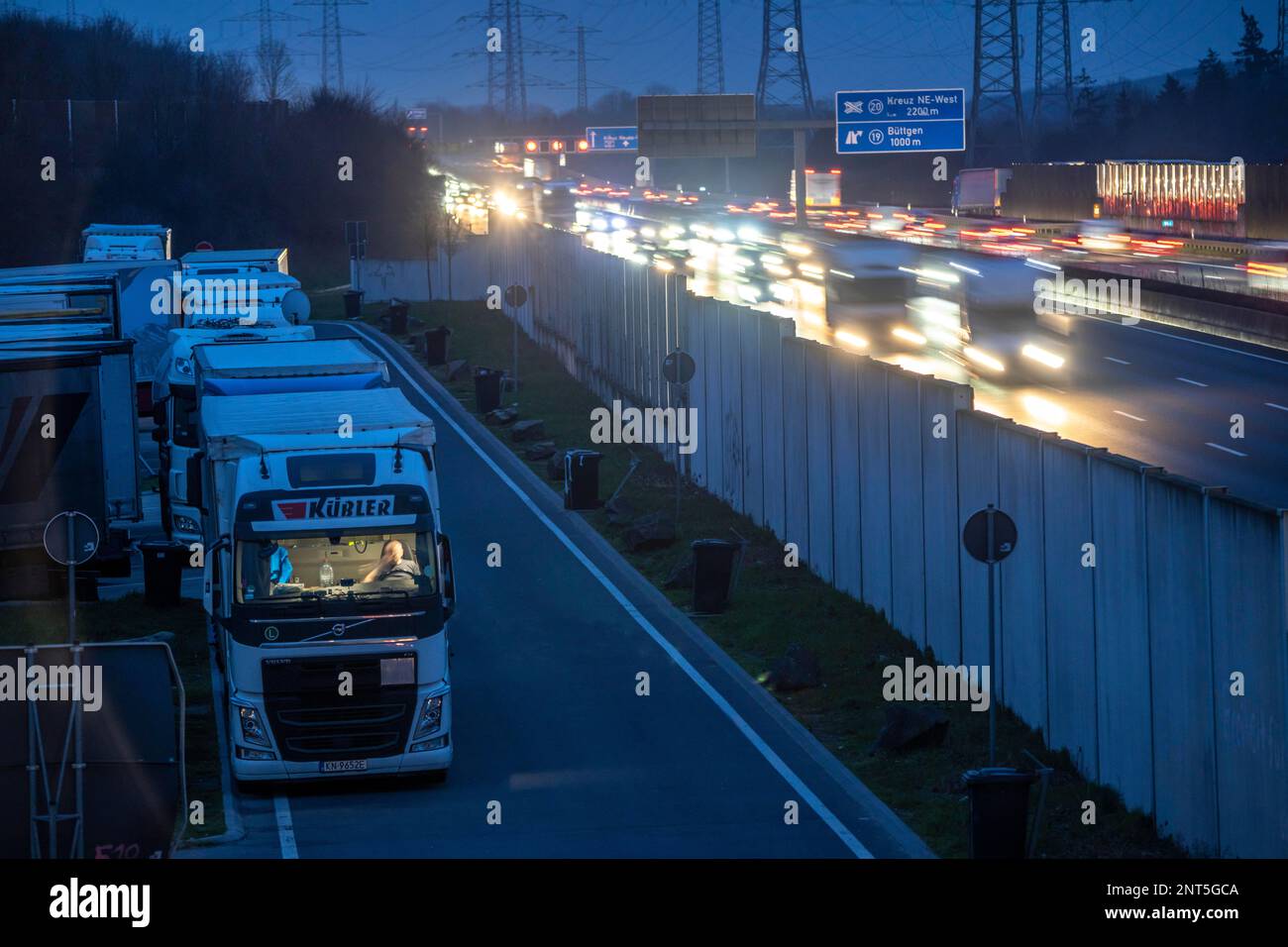 Motorway A57 near Kaarst in the Rhine district of Neuss, view in the direction of the Büttgen junction, heavy evening traffic, car park, full of truck Stock Photo