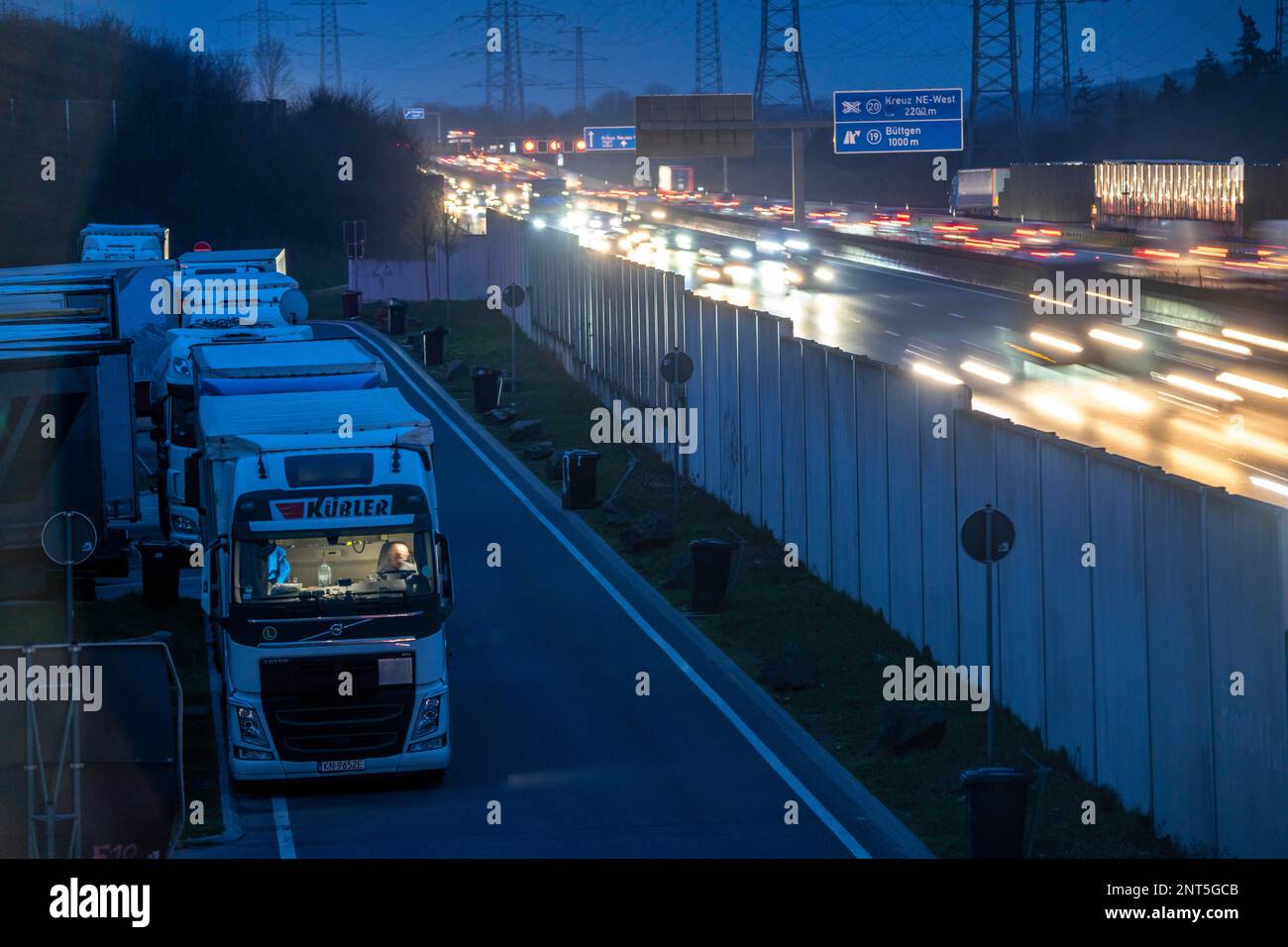 Motorway A57 near Kaarst in the Rhine district of Neuss, view in the direction of the Büttgen junction, heavy evening traffic, car park, full of truck Stock Photo