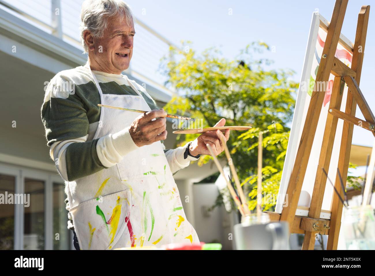 Man in garden painting hi-res stock photography and images - Alamy