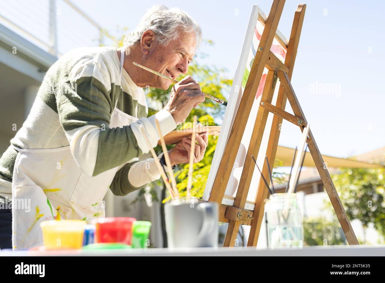 Man in garden painting hi-res stock photography and images - Alamy