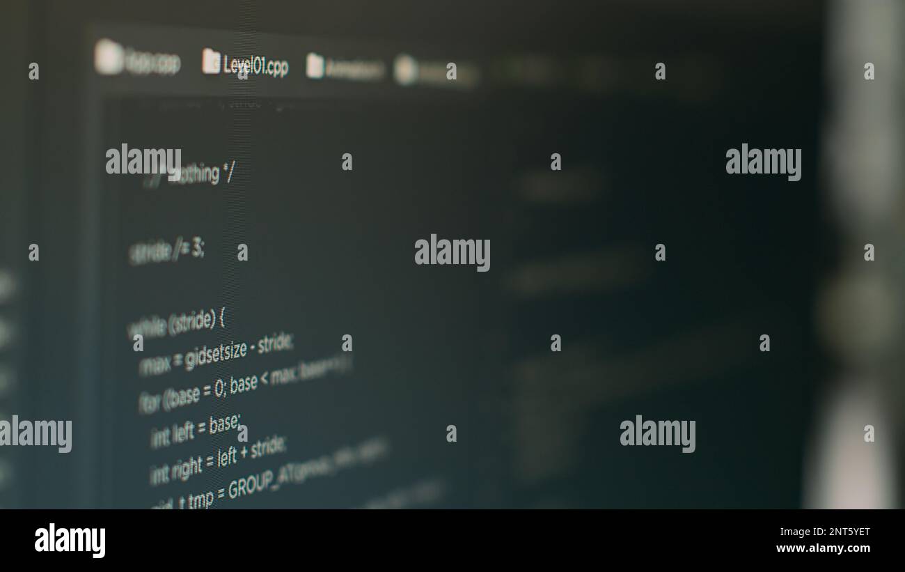 Computer monitor with developing programming and coding technology to create new user interface app in it agency office. Database code to check algorithm and plan security system. Close up. Stock Photo