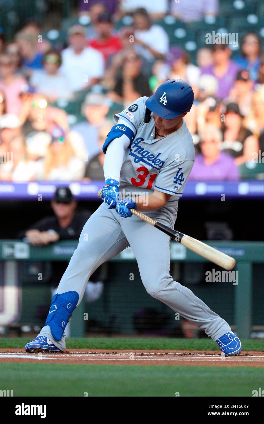 Los Angeles Dodgers left fielder Joc Pederson (31) swings at the