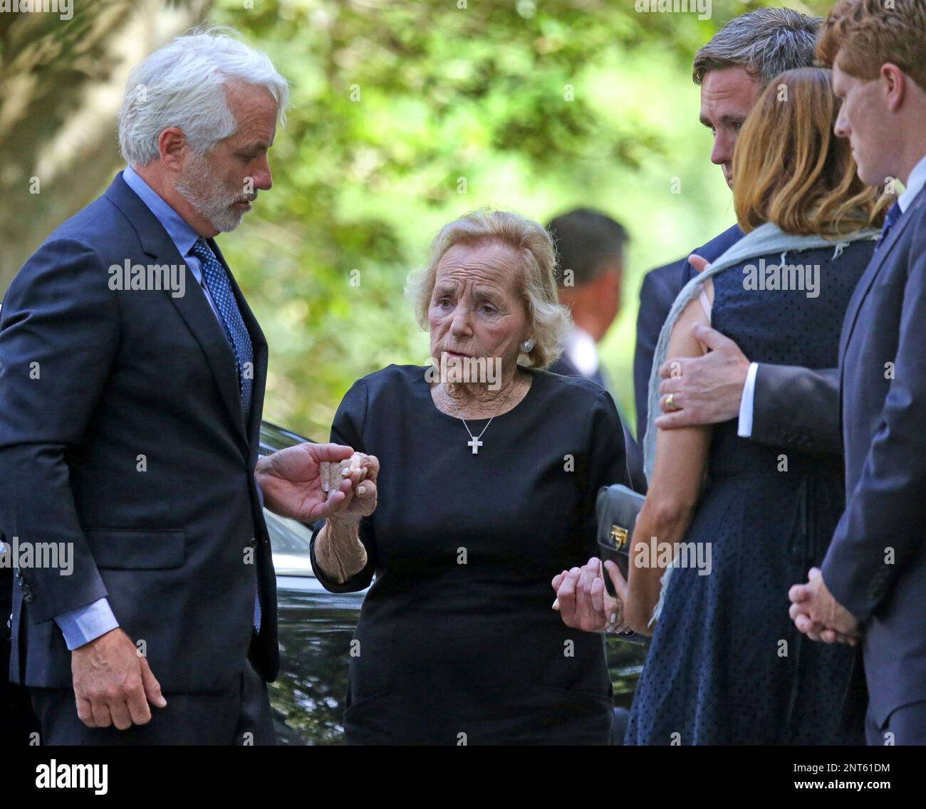 ADDS NAME OF MAX KENNEDYMax Kennedy, left, helps his mother Ethel