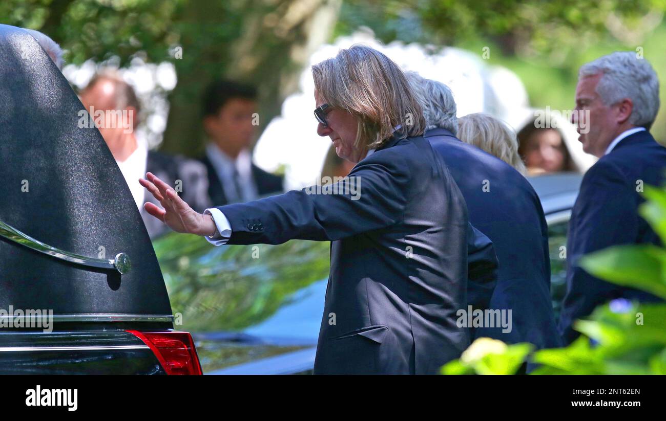 Paul Michael Hill, left, father of Saoirse Kennedy Hill, places his