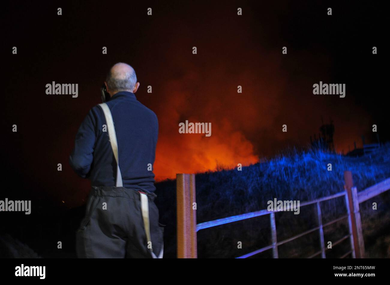 Bantry, West Cork, Ireland. 27th February, 2023. The gorse fire season has recently started in West Cork, pictured below: Seskin Hill in Bantry is in massive flames. Credit: Karlis Dzjamko/ Alamy Live News Stock Photo