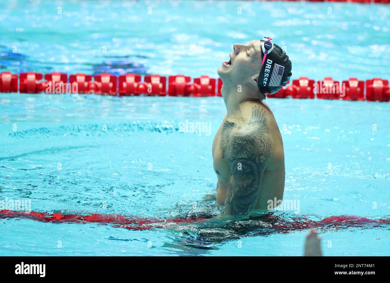 DRESSEL Caeleb of United States of America (black cap) celebrates after ...