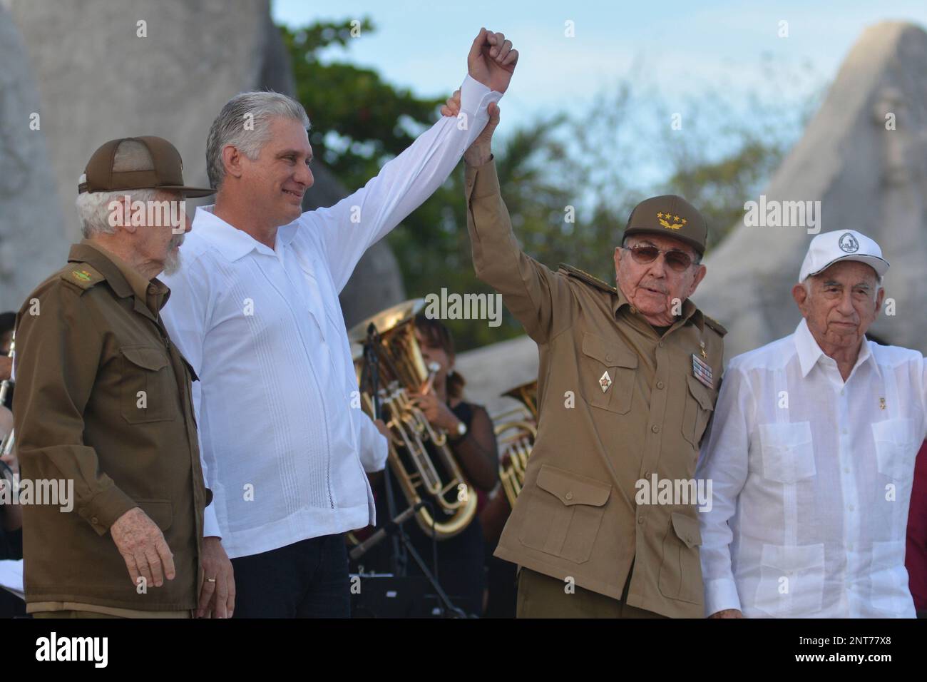 Cuba's President Miguel Diaz-Canel, second left, and former President ...
