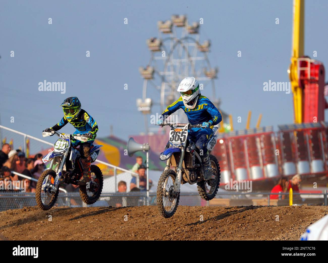 Motocross racers entertain the crowd on opening day of the Lake County Fair Wednesday, July 24, 2019, in Grayslake, Ill