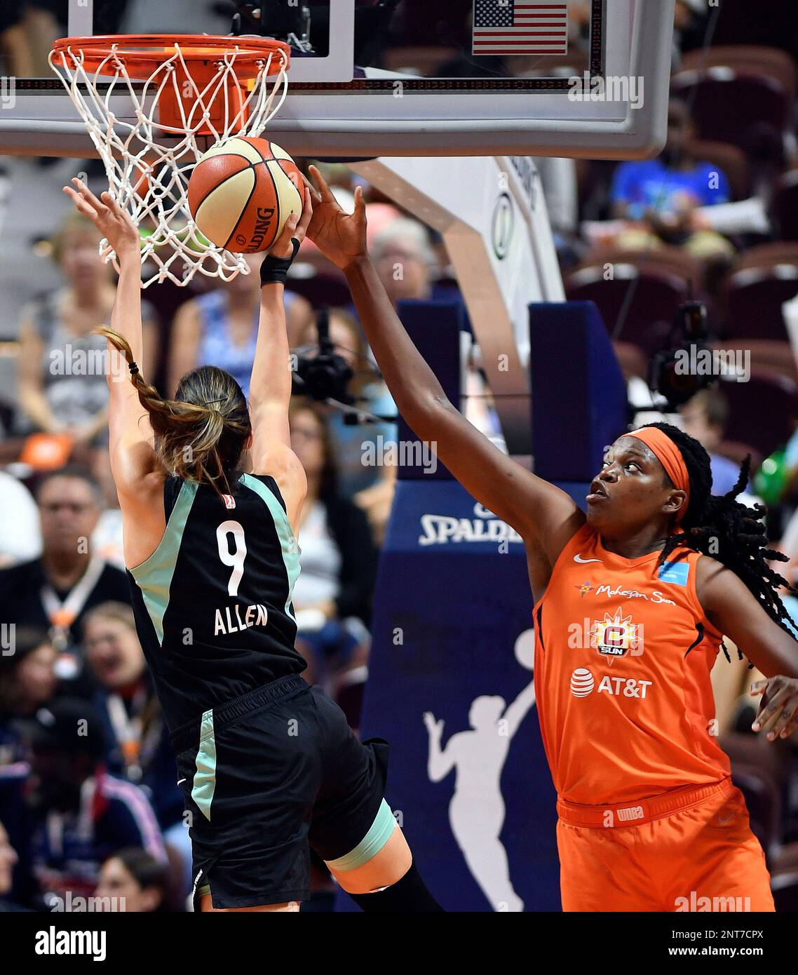 Connecticut Sun center Jonquel Jones blocks a shot attempt from New