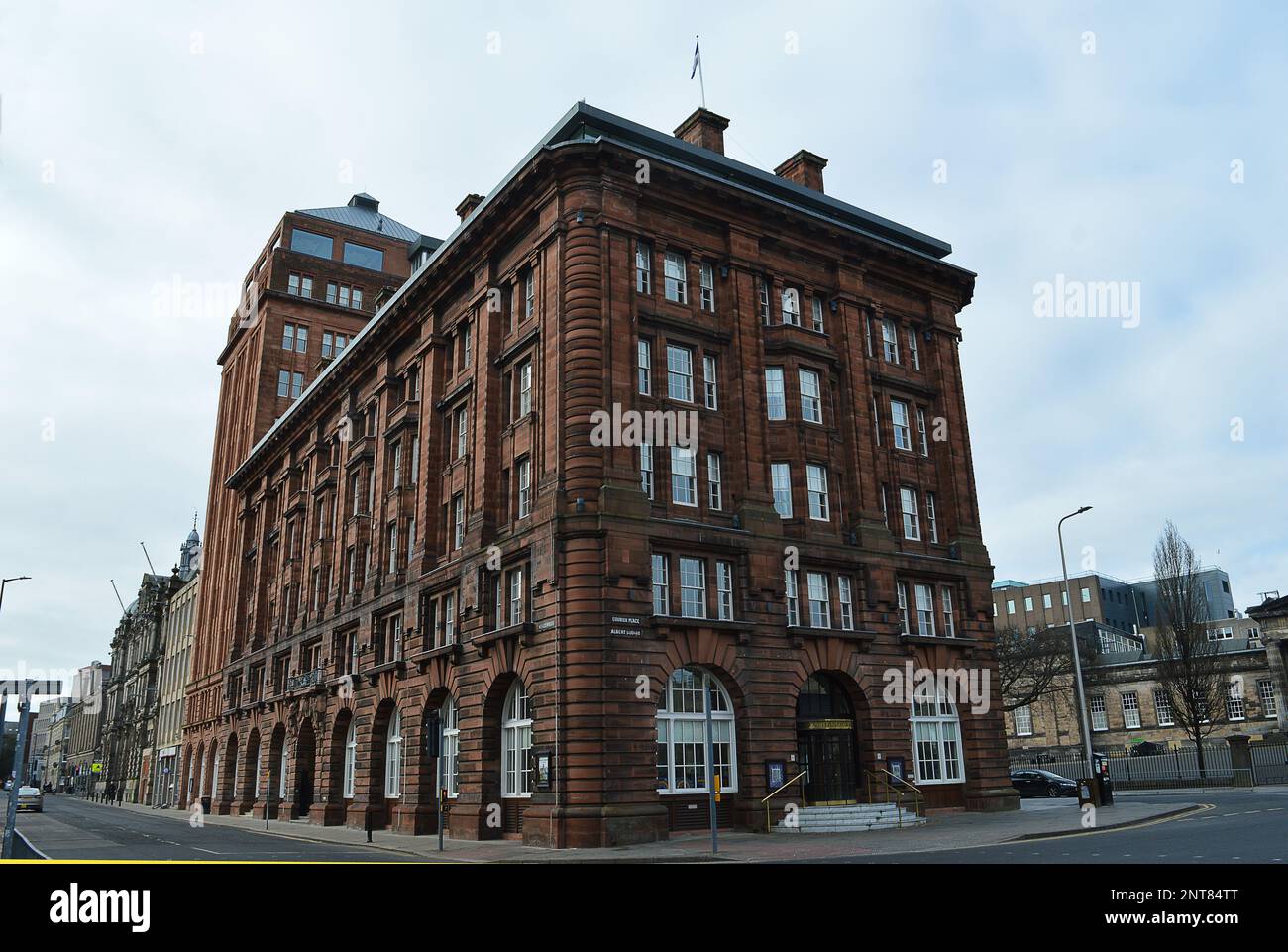 DUNDEE, SCOTLAND - 26 FEBRUARY 2023: The Courier Building, headquarters of publishers D C Thomson & Co, stands on the corner of Meadowside and Albert Stock Photo