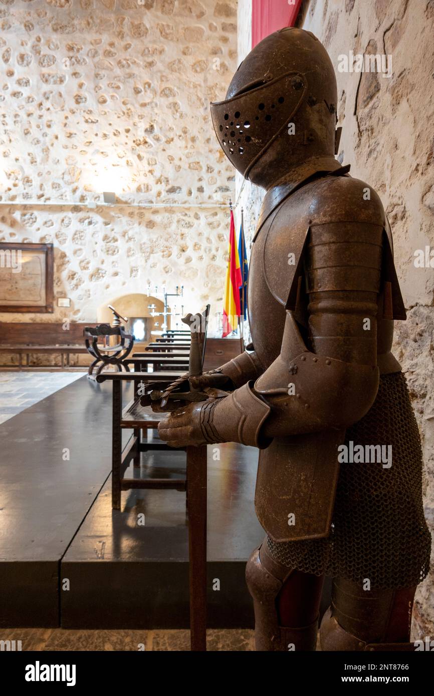 Heavy iron armor in a castle hall Stock Photo