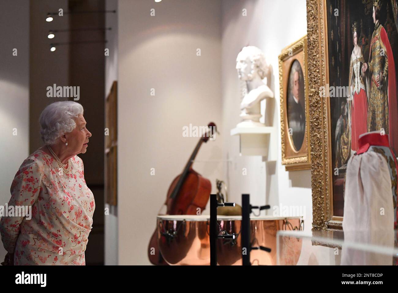 Britain's Queen Elizabeth II views exhibits as part of the exhibition(01)