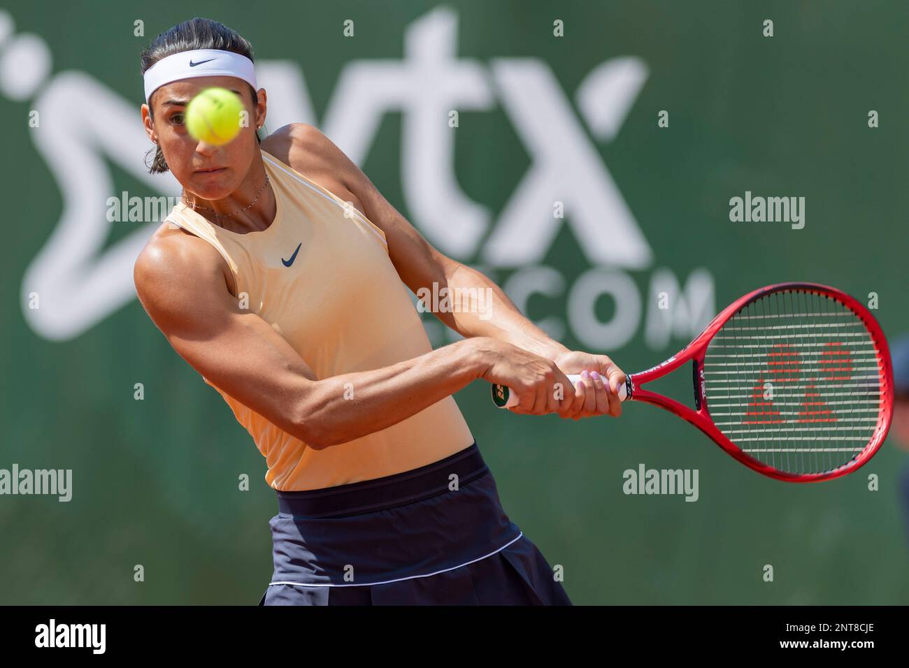 Bernarda Pera of the USA, returns a ball to Caroline Garcia, of France,  during the second round match, at the WTA International Ladies Open  Lausanne tournament, in Lausanne, Switzerland, Wednesday, July 17,