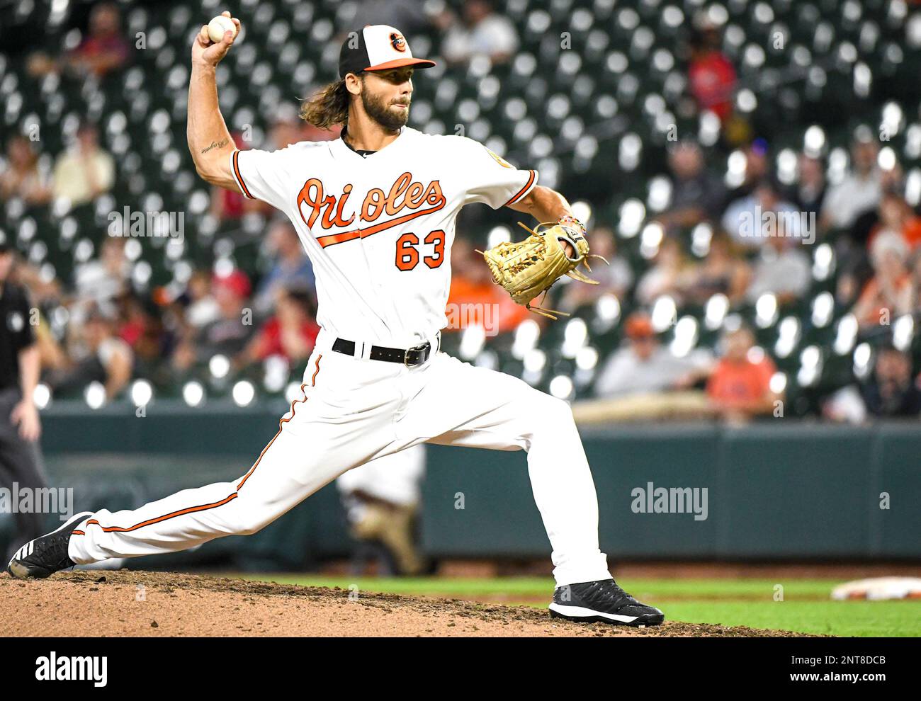 BALTIMORE, MD - JULY 16: Baltimore Orioles relief pitcher Tayler Scott (63)  pitches during the game between the Washington Nationals and the Baltimore  Orioles on July 16, 2019, at Orioles Park at