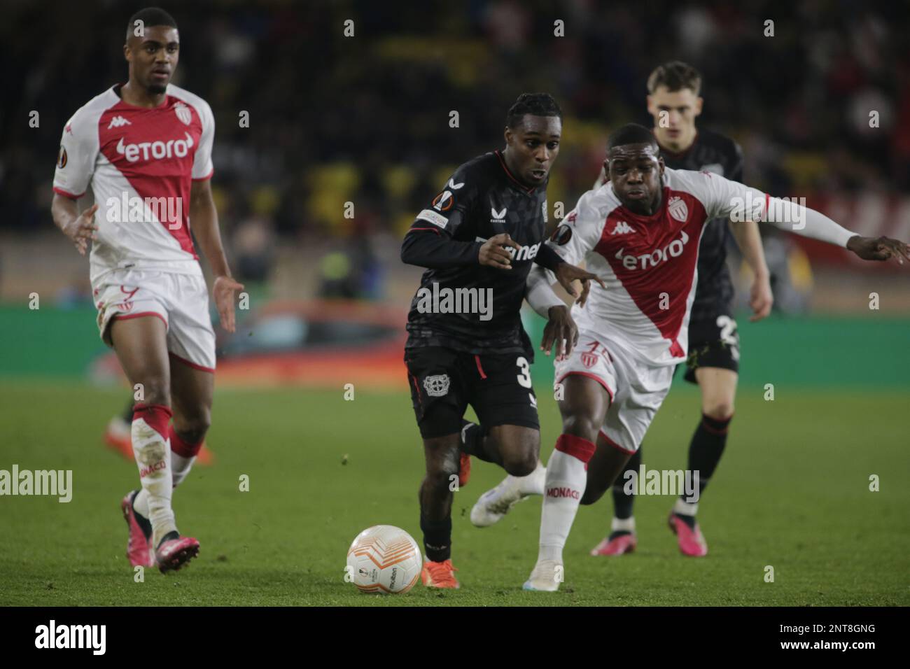 Jeremie FRIMPONG (Bayer 04 Leverkusen, #30) in a duel with Jakub KAMINSKI  (VfL Wolfsburg, #16), Stock Photo, Picture And Rights Managed Image. Pic.  PAH-321123917