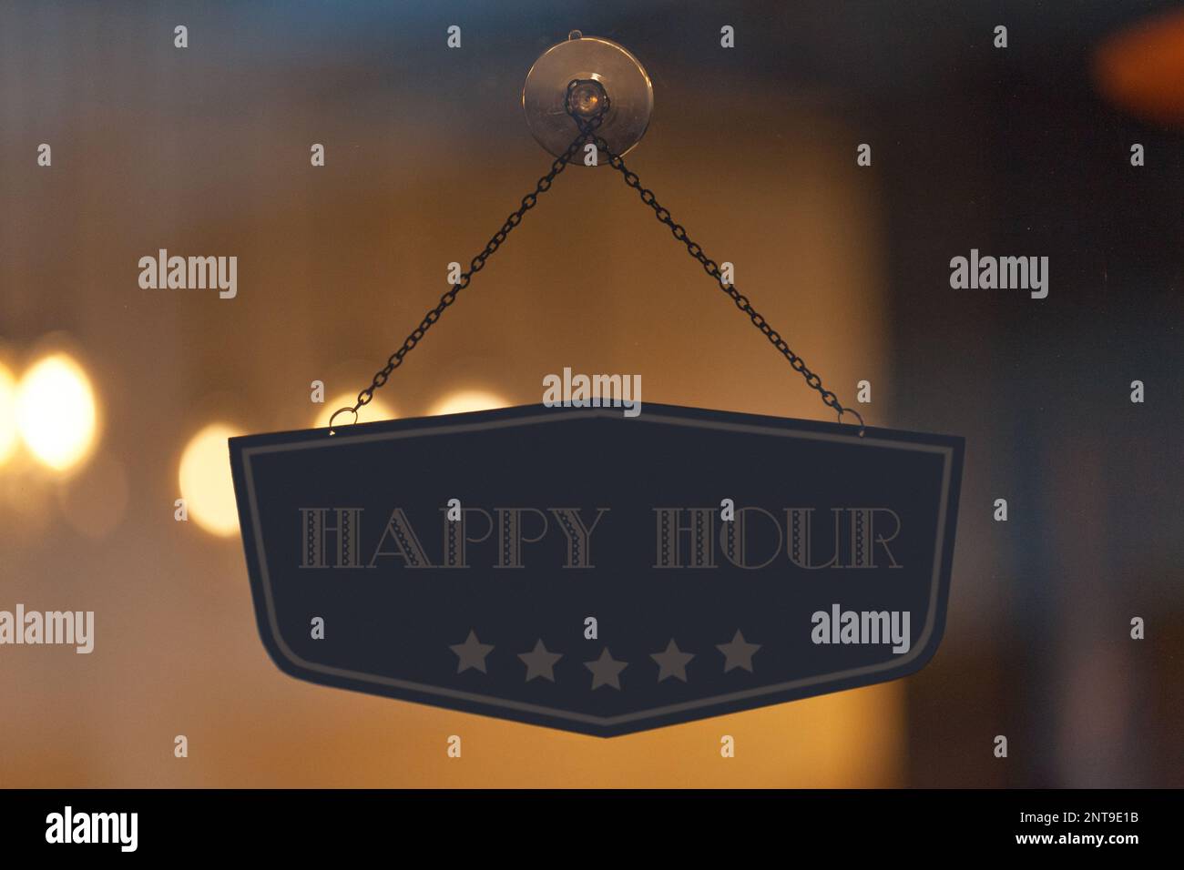 Trendy Happy Hour sign in a window Stock Photo Alamy