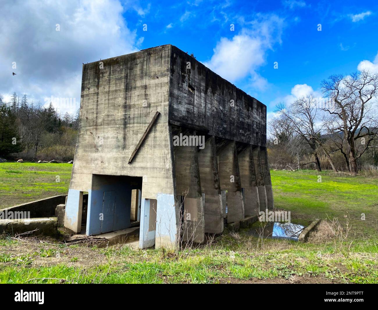 An old abandoned building. Gravel screening plant at Steelhead Beach Regional Park, Forestville, California Stock Photo