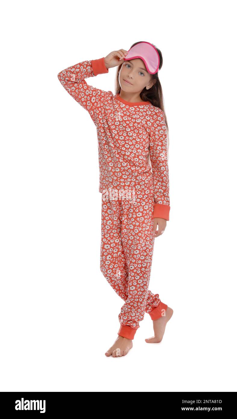 Cute girl wearing pajamas and sleeping mask on white background Stock ...
