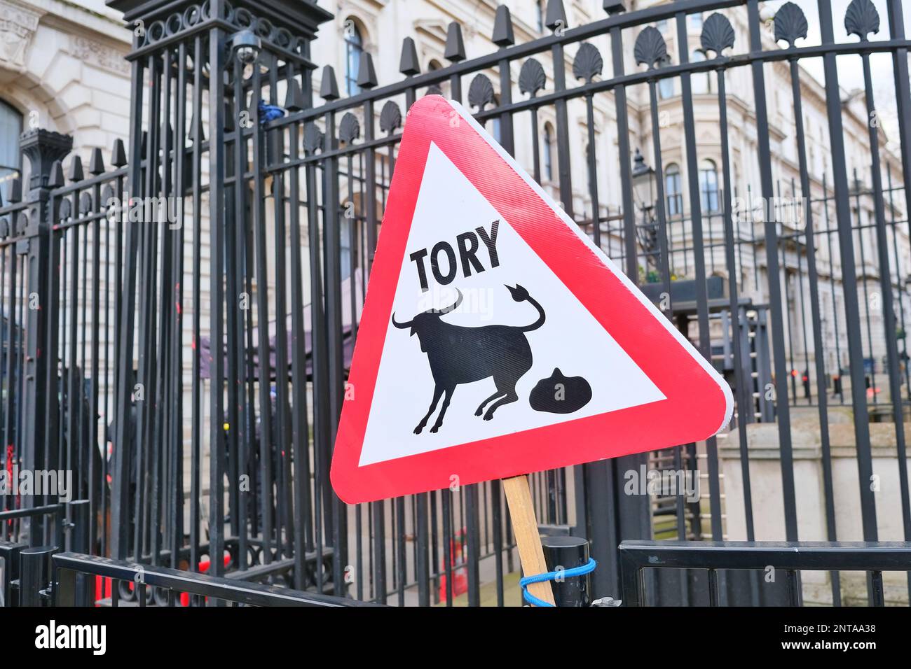 London, UK. A mock road sign warning of 'Tory bullshit', placed by anti-Brexit protesters outside the gates of Downing Street. Stock Photo