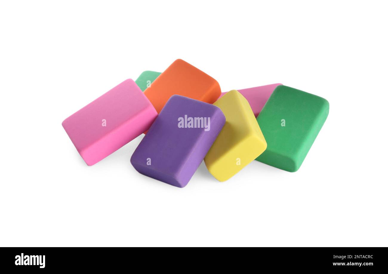 Pile of bright erasers on white background Stock Photo - Alamy
