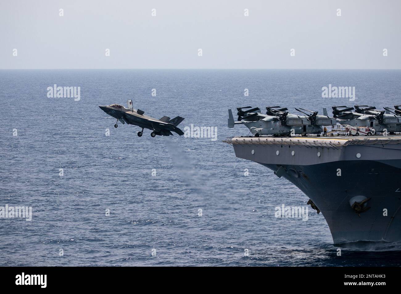 South China Sea. 16th Feb, 2023. An F-35B Lightning II from Marine Fighter Attack Squadron (VMFA) 122, 13th Marine Expeditionary Unit (MEU), launches from the Wasp-class amphibious assault ship USS Makin Island (LHD 8). The Makin Island Amphibious Ready Group, with embarked 13th MEU, and the Nimitz Carrier Strike Group are conducting combined expeditionary strike force (ESF) operations, demonstrating unique high-end war fighting capability, maritime superiority, power projection and readiness. Operations include integrated training designed to advance interoperability between the two grou Stock Photo
