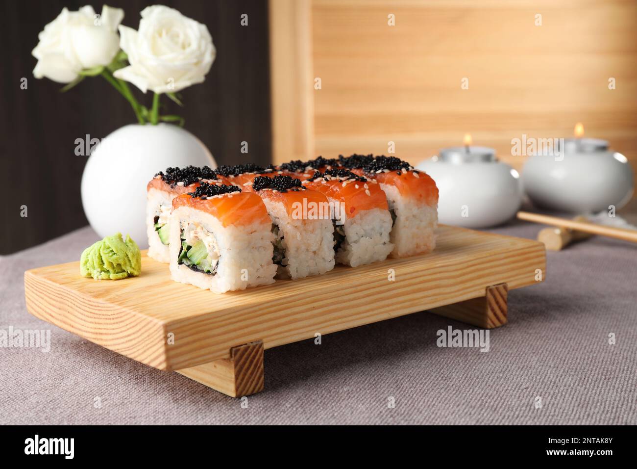 Delicious sushi rolls with salmon served on table Stock Photo