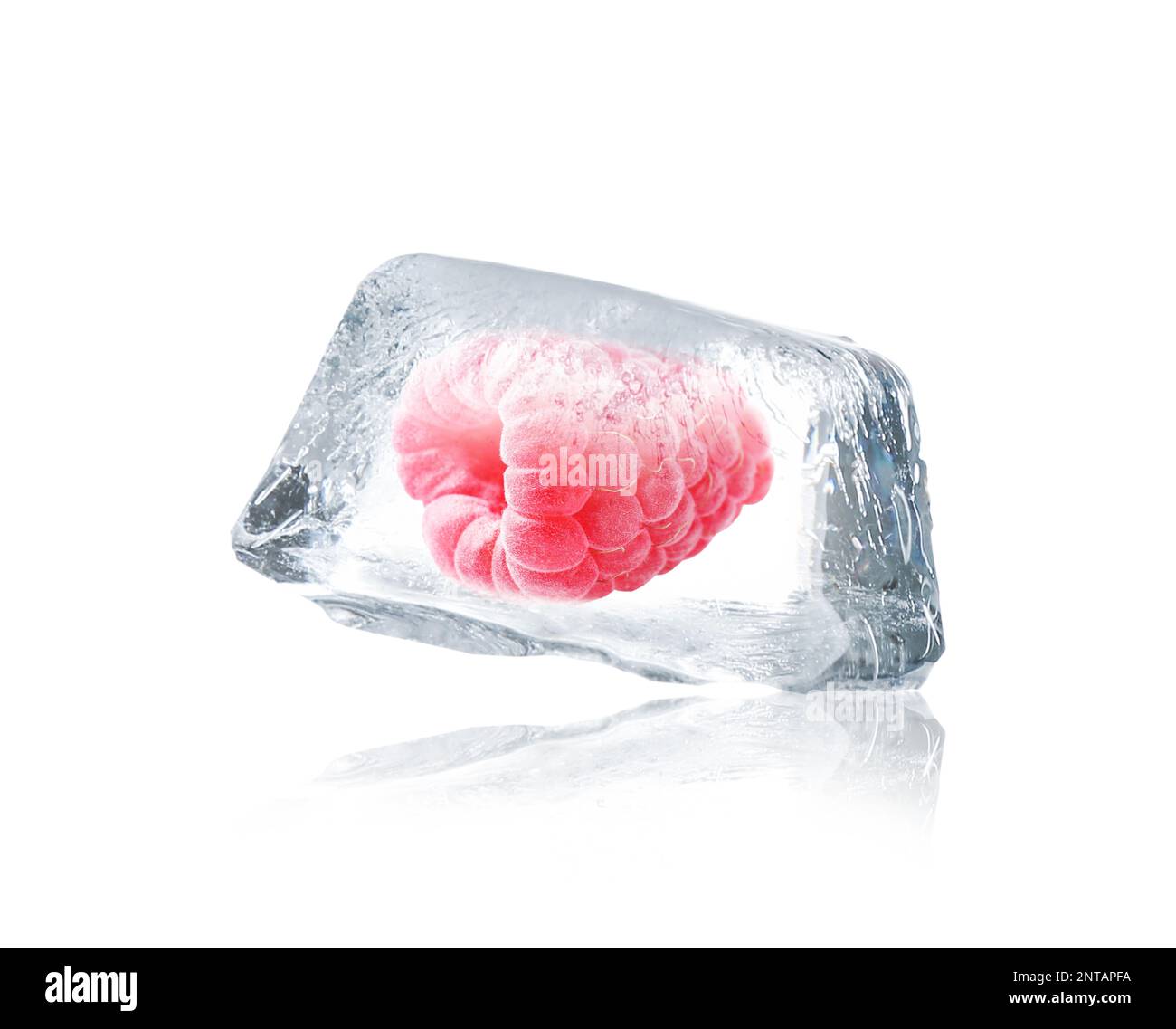 Delicious raspberry frozen in ice isolated on white Stock Photo - Alamy