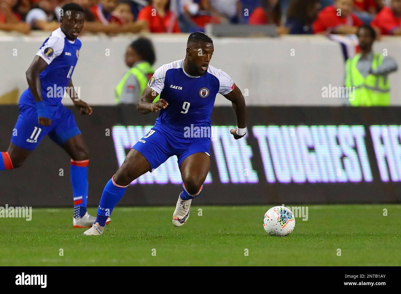 HARRISON, NJ - JUNE 24: Haiti forward Jonel Desire (18) controls