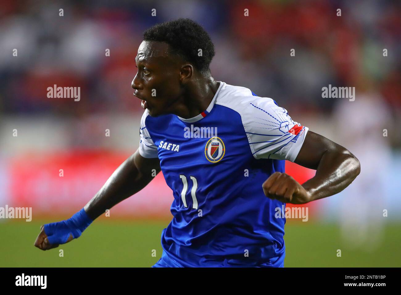 HARRISON, NJ - JUNE 24: Haiti forward Jonel Desire (18) controls