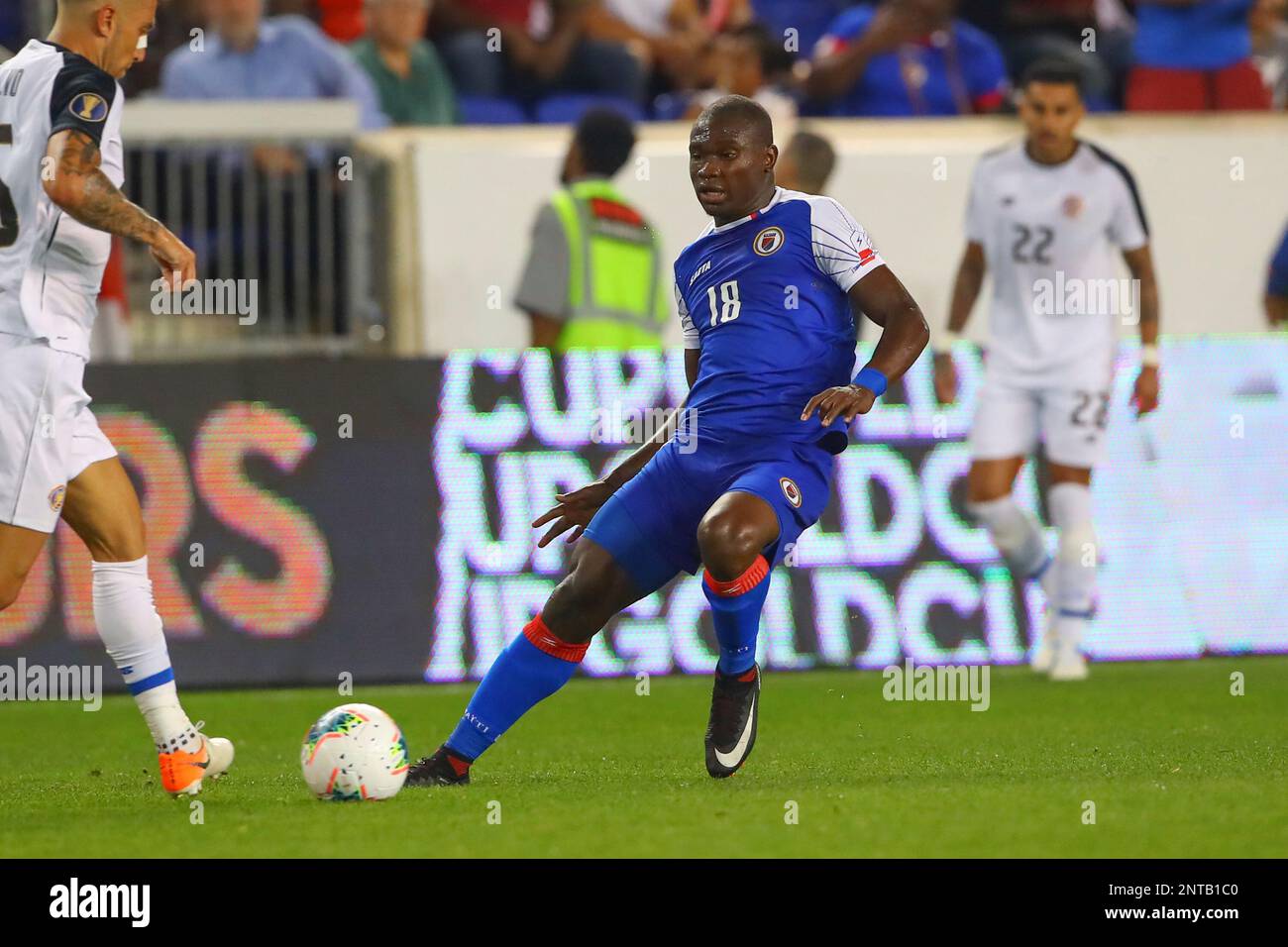 HARRISON, NJ - JUNE 24: Haiti forward Jonel Desire (18) controls