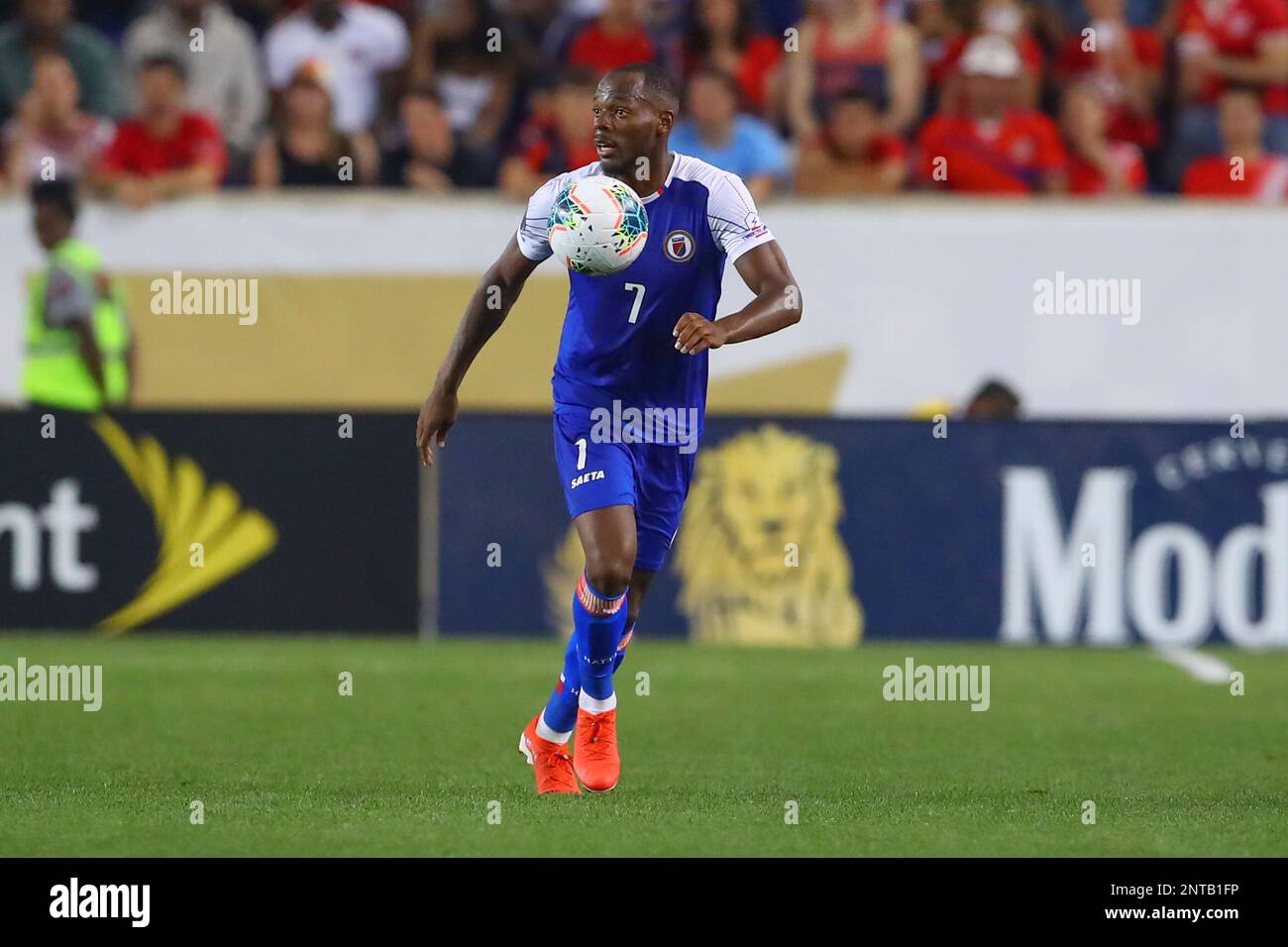 HARRISON, NJ - JUNE 24: Haiti forward Jonel Desire (18) controls