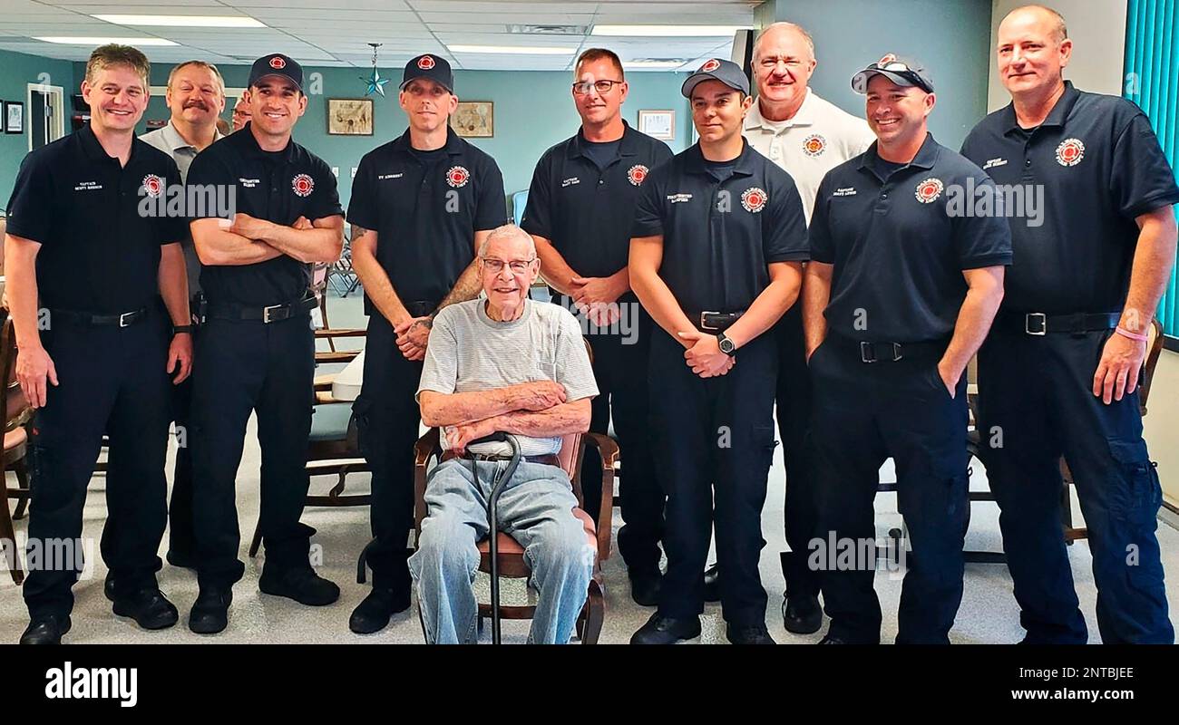 In a June 4, 2019 photo, Galesburg firefighters pose with former