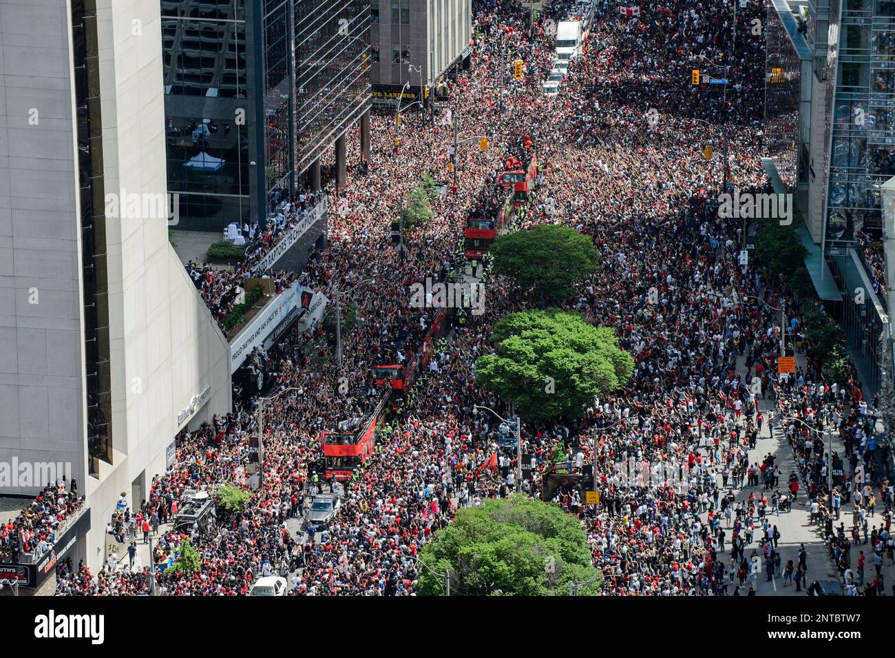 Fans cheer during the Toronto Raptors NBA basketball championship victory parade in Toronto Monday June 17 2019. Andrew Lahodynskyj The Canadian Press via AP Stock Photo Alamy