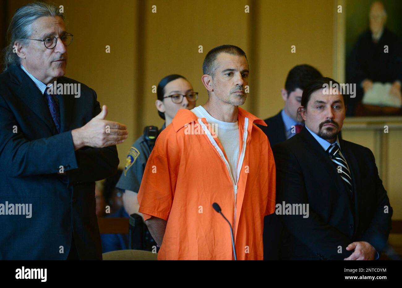 Fotis Dulos center listens as his attorney Norm Pattis left