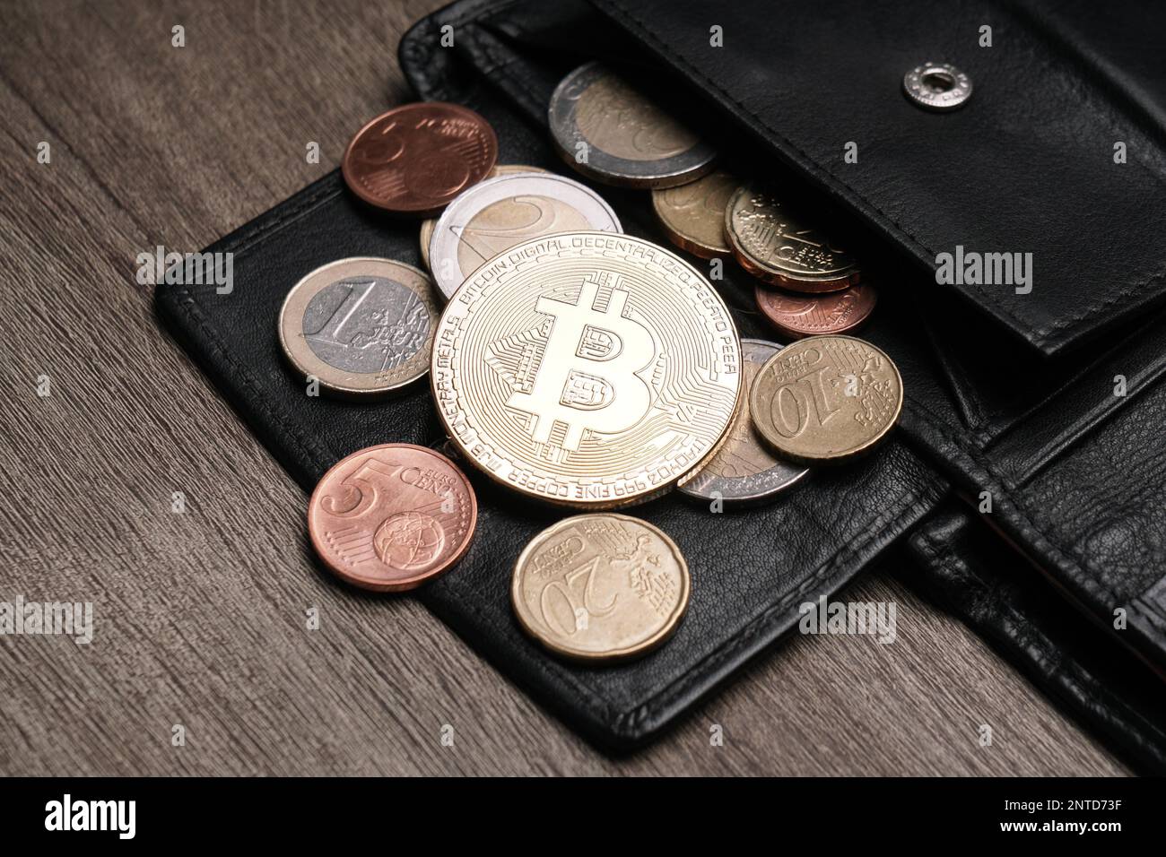 Wallet with bitcoin euro and cent coins Stock Photo - Alamy
