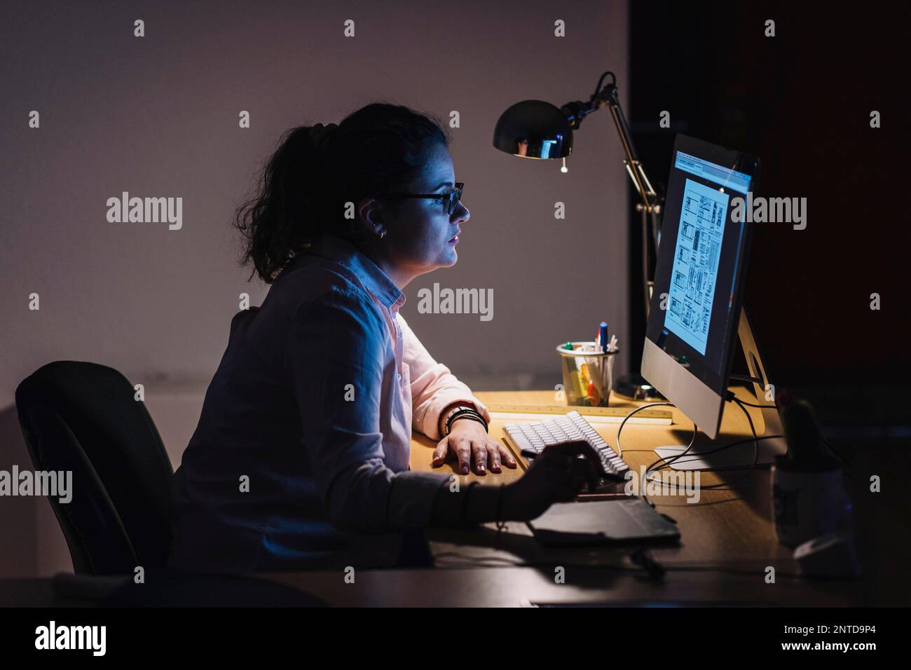 designer working night. Beautiful photo Stock Photo