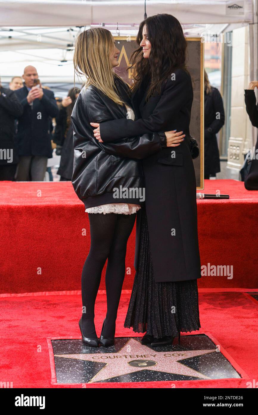 Coco Arquette, left, hugs her mother, Courteney Cox, at the star